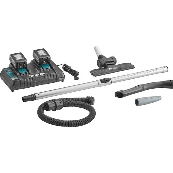 A Makita backpack vacuum cleaner with hose and accessories.