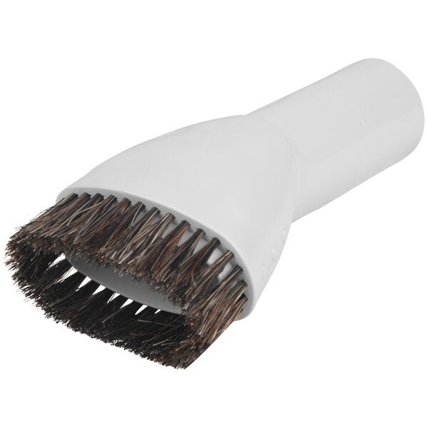 A white Makita round brush with black bristles.