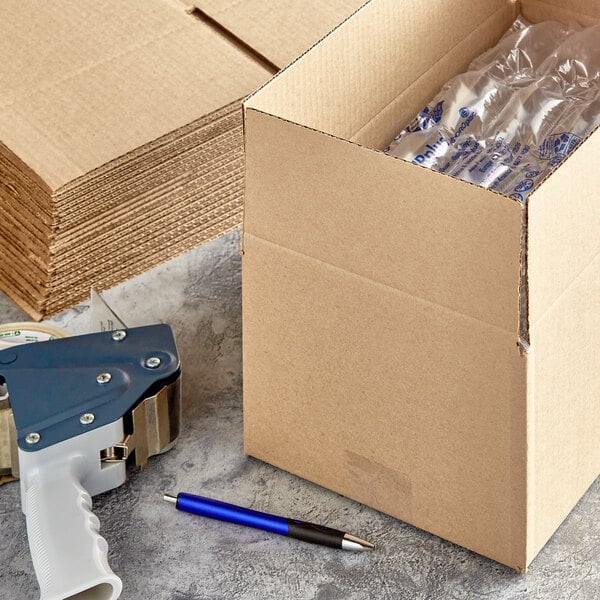 A Lavex Kraft corrugated shipping box on a grey surface.