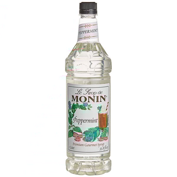 A close up of a Monin peppermint syrup bottle.