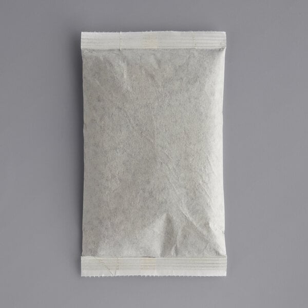 A white bag with a black handle.