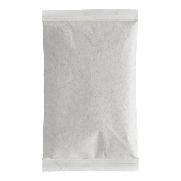 A sealed, rectangular white filter pack bag with a slightly textured surface.