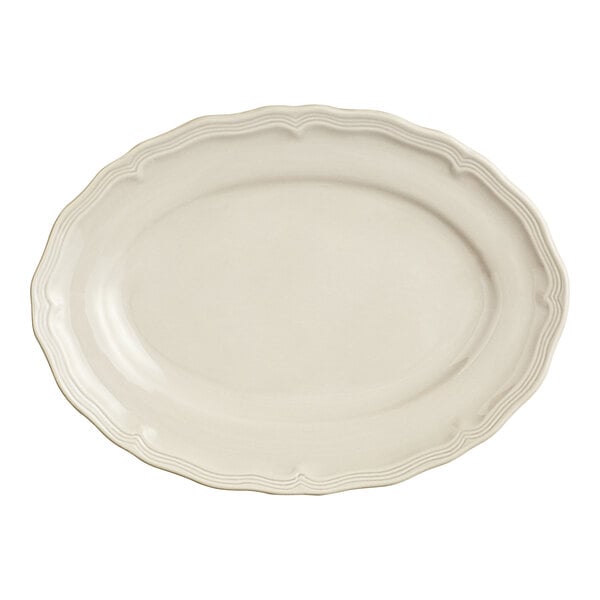 A white oval platter with a scalloped edge.