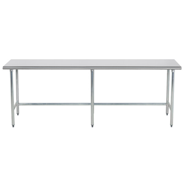 An Advance Tabco stainless steel work table with an open base.