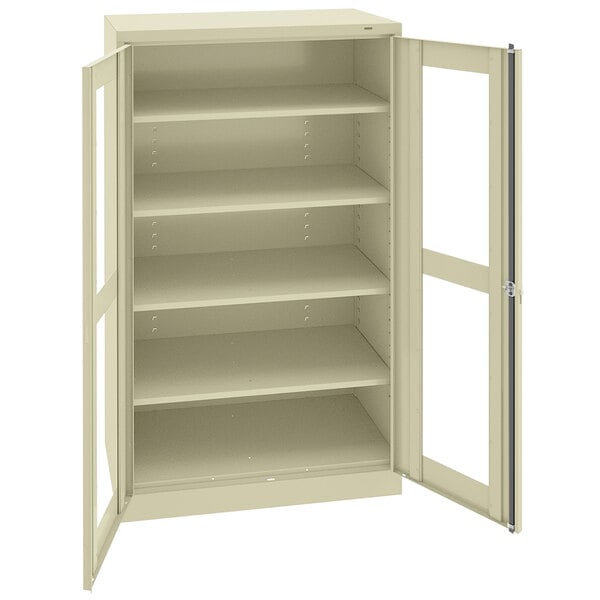 A beige Tennsco storage cabinet with open C-Thru doors.