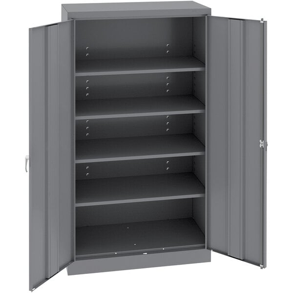 A dark gray metal Tennsco storage cabinet with solid doors.