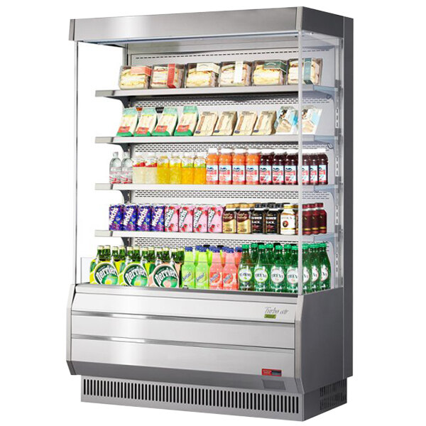 A Turbo Air stainless steel vertical refrigerated open curtain merchandiser filled with drinks and snacks.