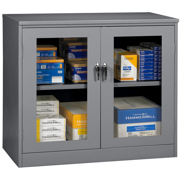 A dark gray Tennsco jumbo storage cabinet with C-Thru doors.