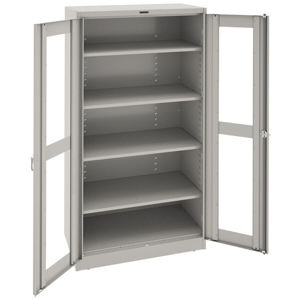 A light gray metal storage cabinet with open C-Thru doors.