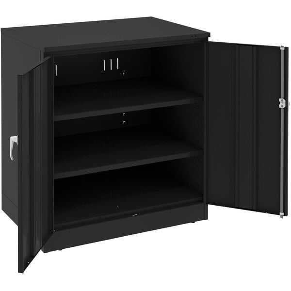 A black Tennsco metal storage cabinet with open solid doors.