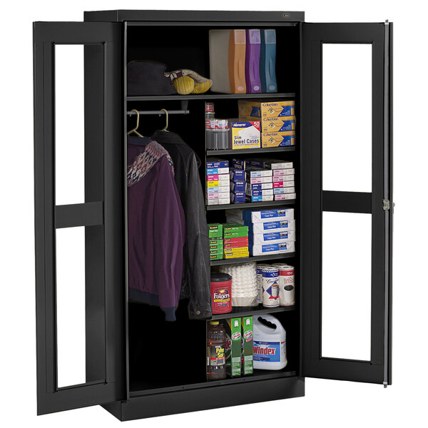 A black metal Tennsco storage cabinet with open doors.