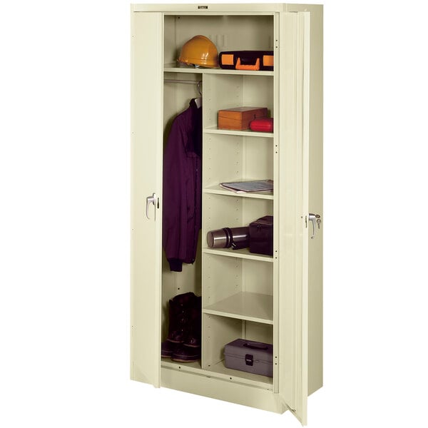 A white metal Tennsco combination cabinet with shelves and tools.