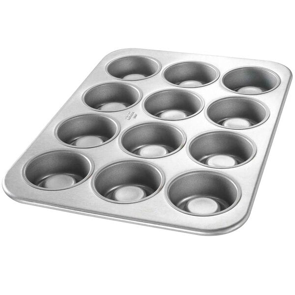 A Chicago Metallic MaryAnn specialty pan with six cupcake holes.