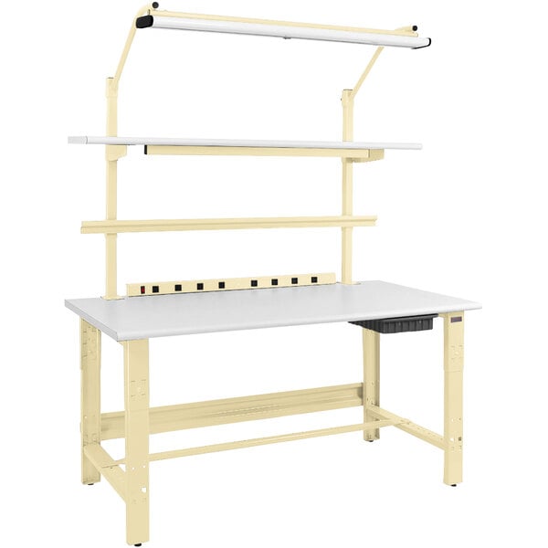 A white workbench with a beige frame and round front edge.