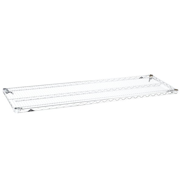 A Metro Super Erecta chrome wire shelf with two shelves on it.