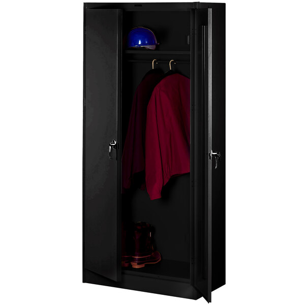 A black metal locker with a red jacket and a helmet.