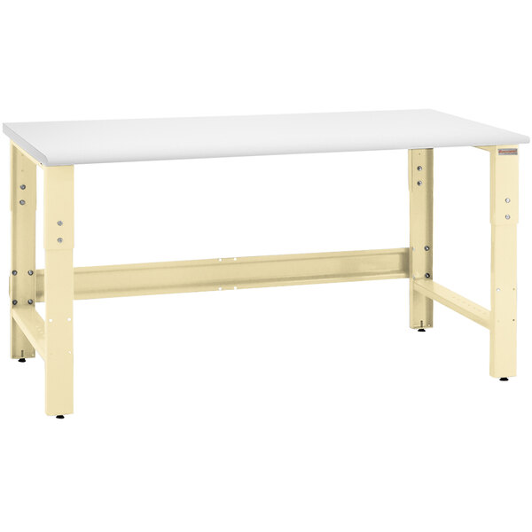 A white workbench with a white surface and beige legs.