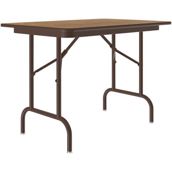 A brown rectangular Correll folding table with metal legs and a wood surface.