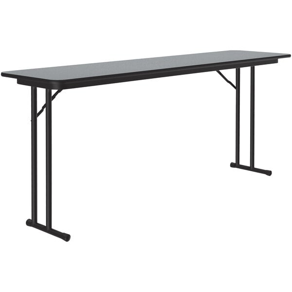 A gray granite Correll seminar table with off-set black legs.