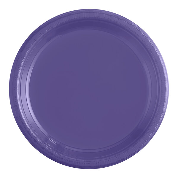 A close-up of a purple plastic plate with a white background.