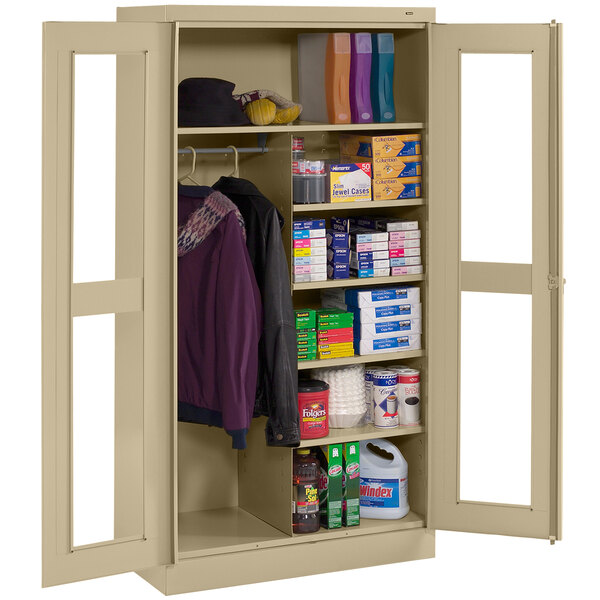 A large Tennsco sand metal combination cabinet with C-Thru doors and shelves.