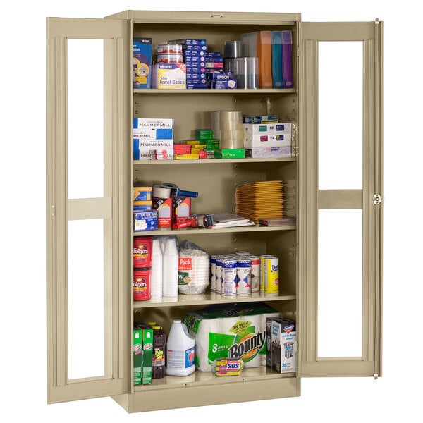 A Tennsco sand storage cabinet with C-Thru doors and items inside.