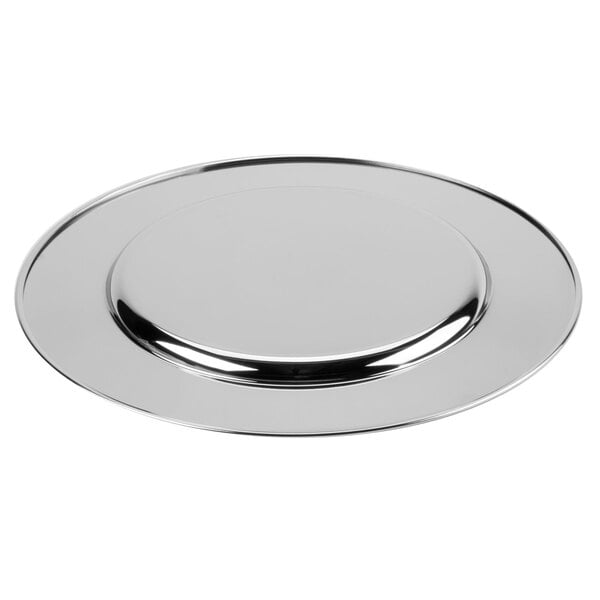 A silver charger plate with a round surface and a silver rim.