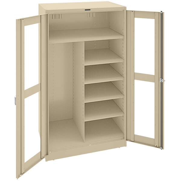 A tan Tennsco industrial storage cabinet with open C-Thru doors.