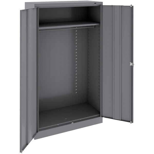 A grey metal cabinet with open door.