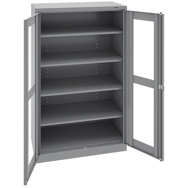 A dark grey metal Tennsco storage cabinet with open doors.