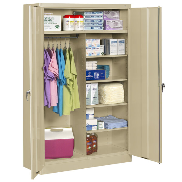 A Tennsco sand jumbo combination cabinet with solid doors and items on the shelves.