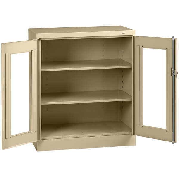 A tan Tennsco metal storage cabinet with open C-Thru doors.