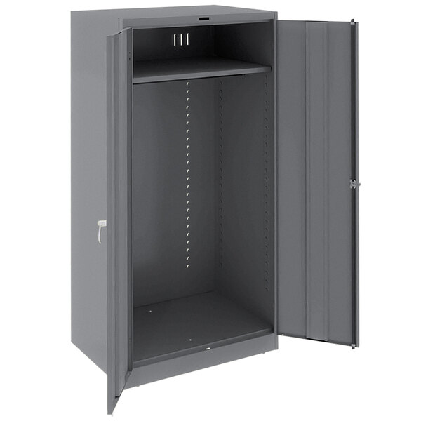 A grey metal Tennsco wardrobe cabinet with open doors.