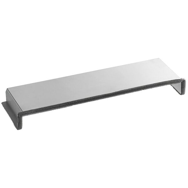 A silver metal rectangular air duct top with black foam and a grey handle.