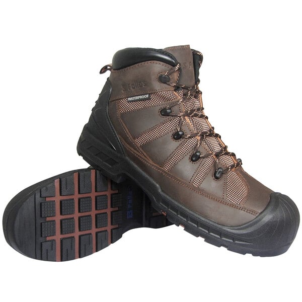 A brown and black Genuine Grip Trekker safety boot with black laces and a black sole.