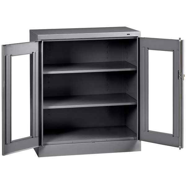 A Tennsco dark gray metal storage cabinet with open C-Thru doors.