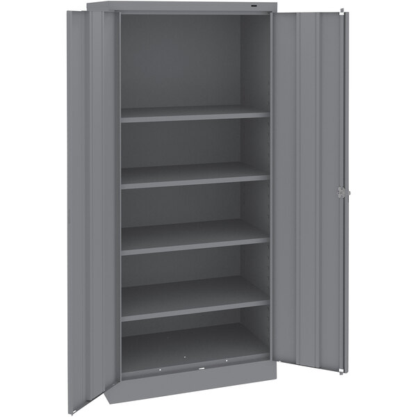 A dark gray metal Tennsco storage cabinet with solid doors.