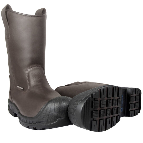 A pair of brown Genuine Grip Wellington work boots with rubber soles.