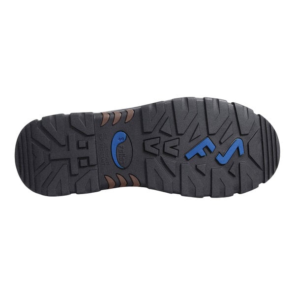 The image shows the black rubber outsole of a shoe with deep treads and blue accents.