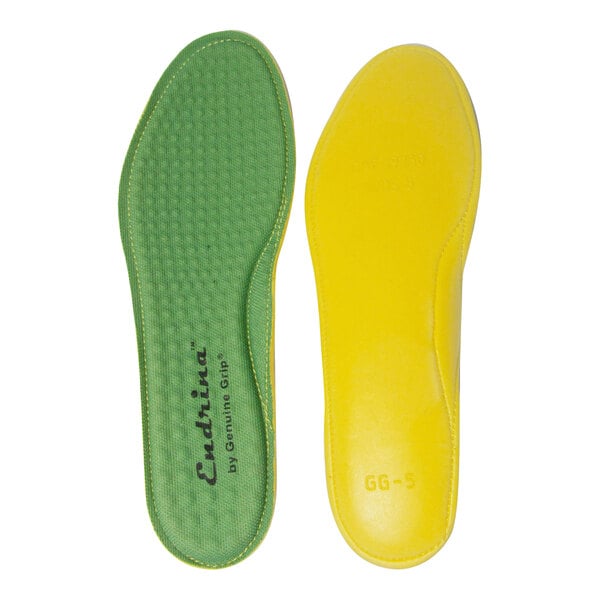 Two shoe insoles are shown, one with a green textured surface and the other with a smooth yellow surface.