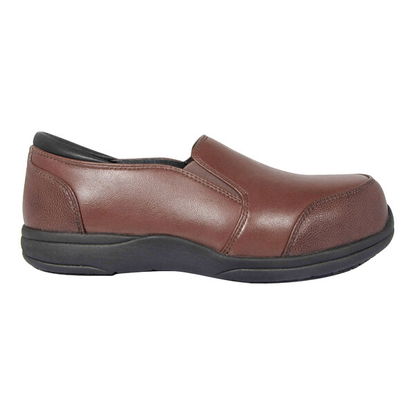 A brown slip-on shoe with a black sole and a rounded toe, shown in a side profile view.