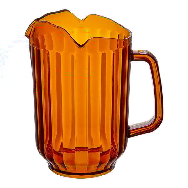 An amber SAN plastic pitcher with a handle and 3 spouts.