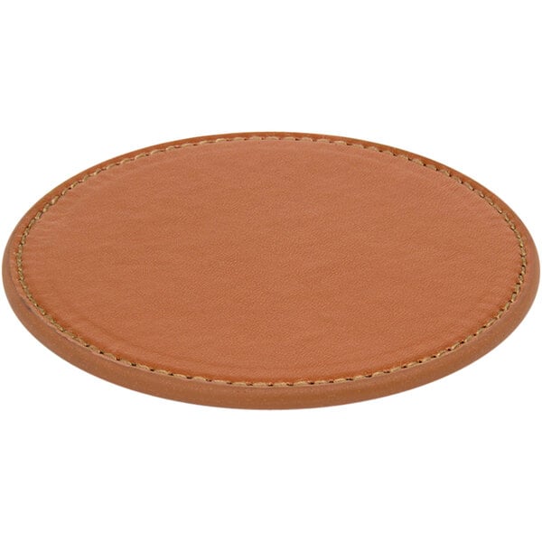 A brown vinyl coaster with stitching on it.