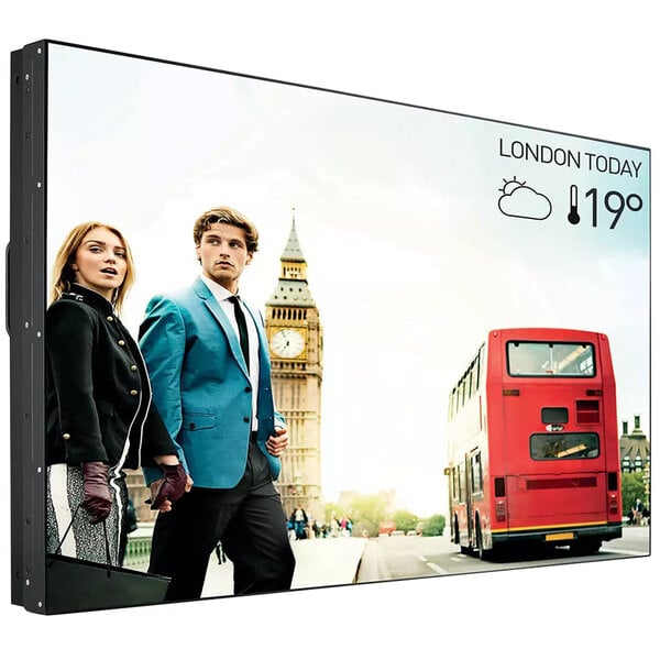 A Philips X-Line video wall display screen showing two people walking.