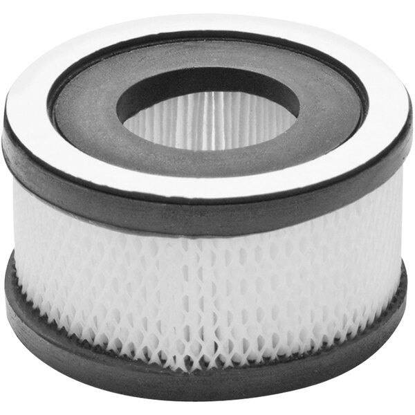 A close-up of a white circular air filter with a hole in the center.