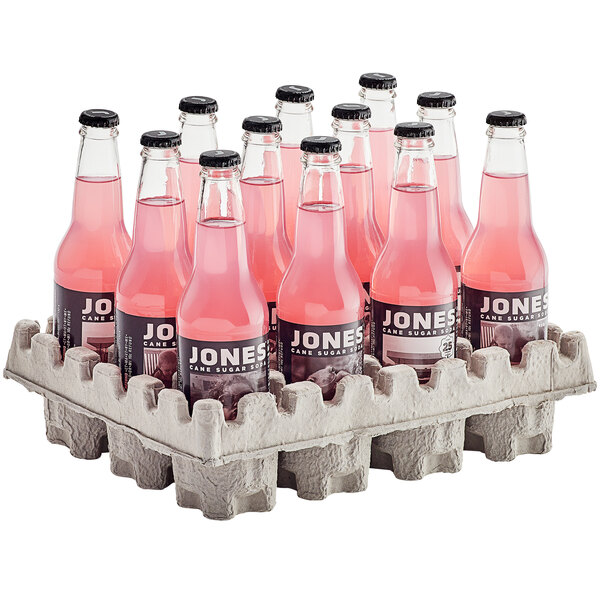 A case of 24 Jones Watermelon Soda bottles with pink liquid on a white background.