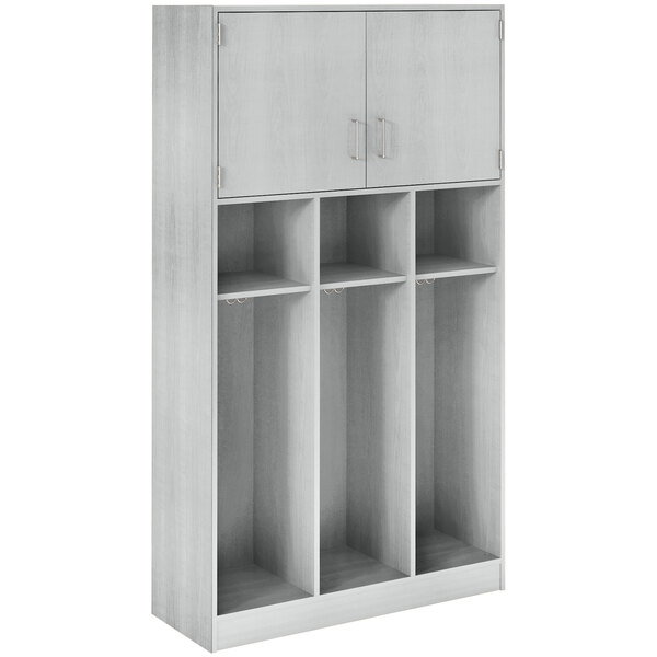 A grey triple upper door storage locker with adjustable middle shelves.