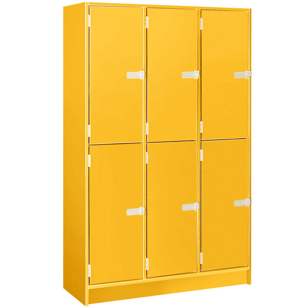 A sun yellow I.D. Systems locker with four doors and white handles.