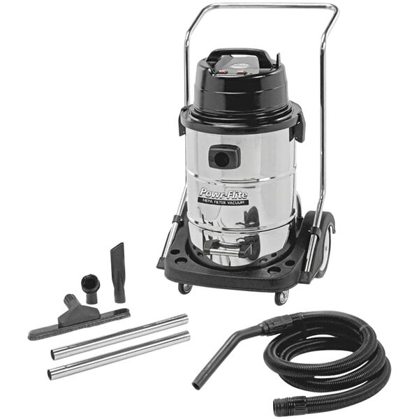 A Powr-Flite stainless steel wet/dry vacuum with hose and accessories.