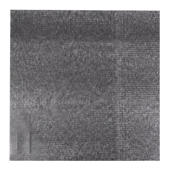 A close-up of a black Cactus Mat shelf liner.